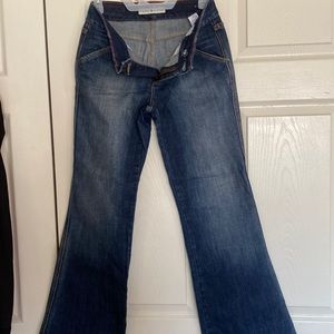 Size 2  jeans like new wide leg pattern on back pockets